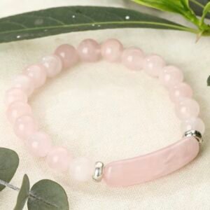 PULSERA CUENTAS REDONDAS Y UNA ALARGADA CUARZO ROSA